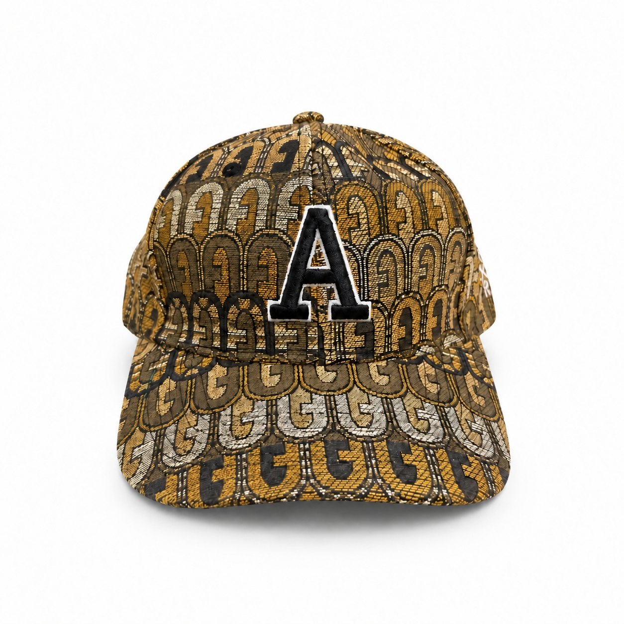 Gold-tone, tan and black patterned baseball cap with a black embroidered A and white outline
